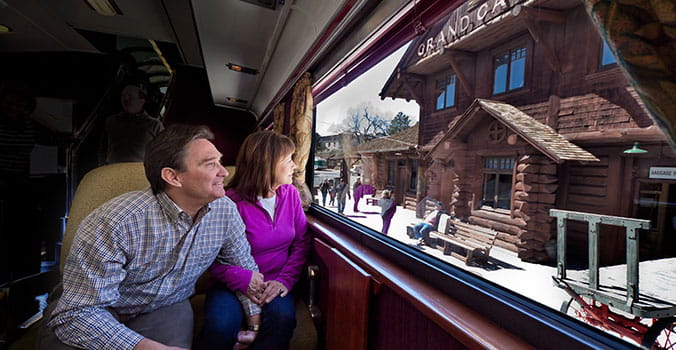 Passengers on the Grand Canyon Railway train look out the window