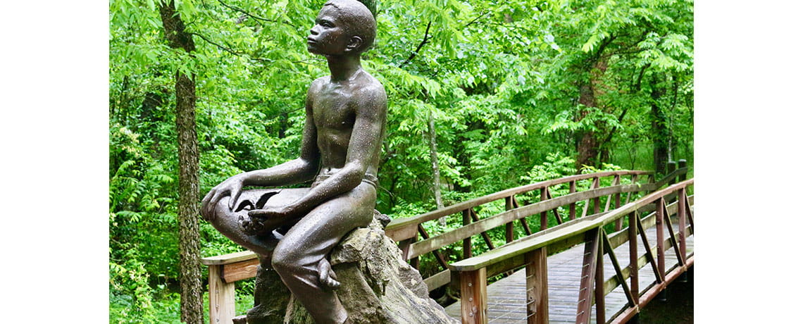 The Boy Carver statue by Robert Amendola depicts the young Carver in his secret garden. Photo by Larissa Milne