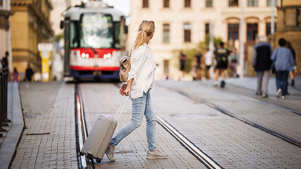 Woman walking with luggage