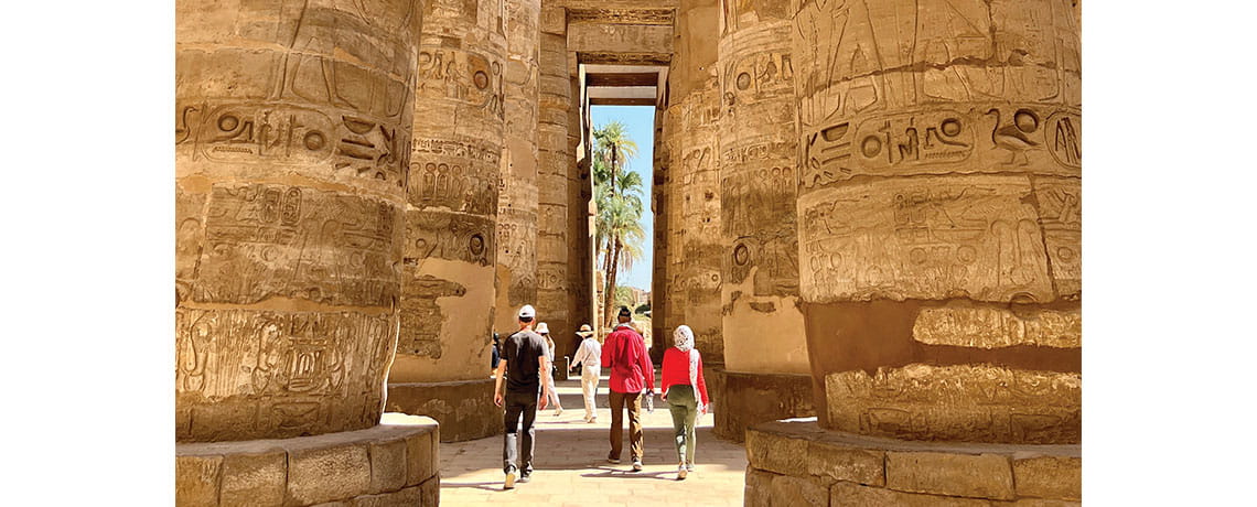 Visitors walk among towering columns at Karnak, a UNESCO World Heritage Site. Photos by Lauren Keith