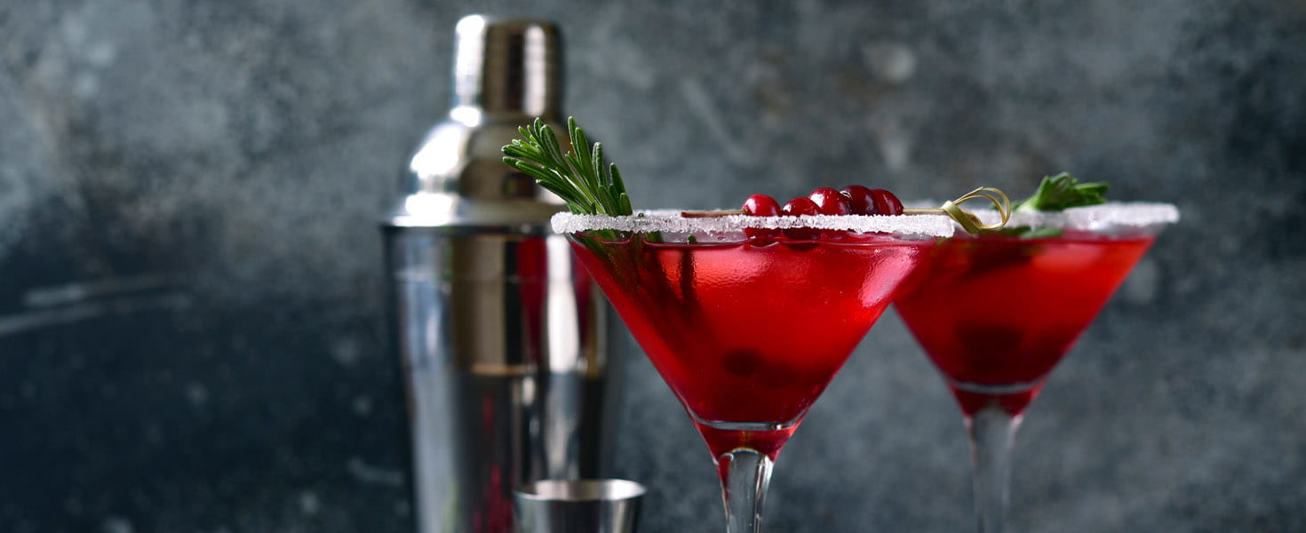 Alcoholic Cranberry Cocktail in cocktail glasses