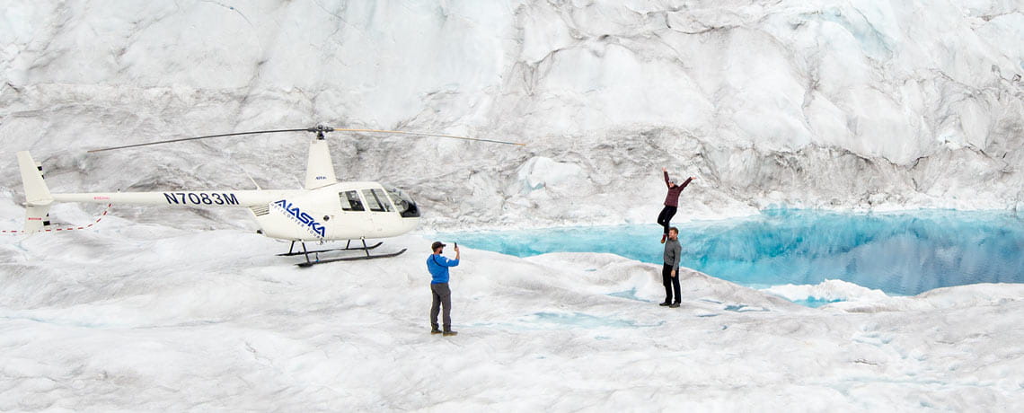 A helicopter on the Knik Glacier in Alaska 