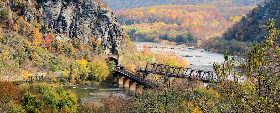 A railroad bridge and a pedestrian bridge span the Potomac near Harper’s Ferry.