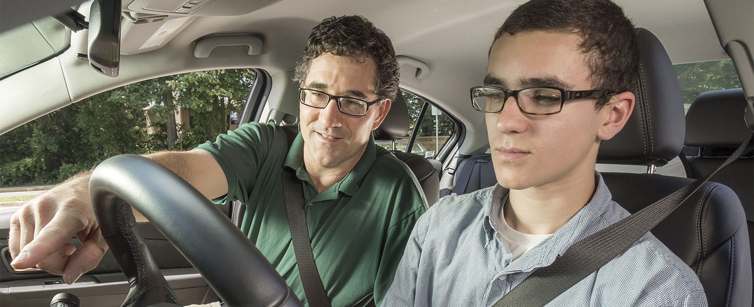 Parent and Teen in a driving vehicle