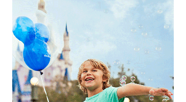 Boy with Balloons by Disney World