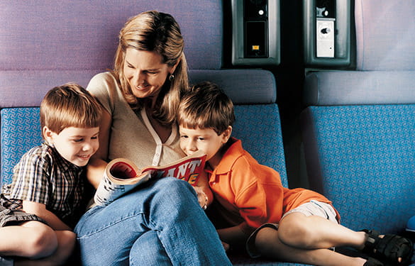 Mom with kids in Amtrak family sleeping car