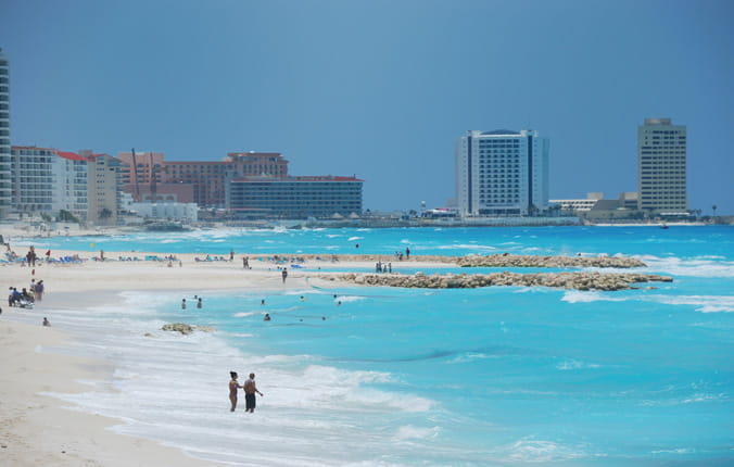Popular beach in Cancun, Mexico with beautiful blue water