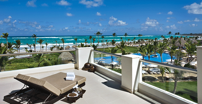 lounge chair overlooking pool and ocean in Punta Cana