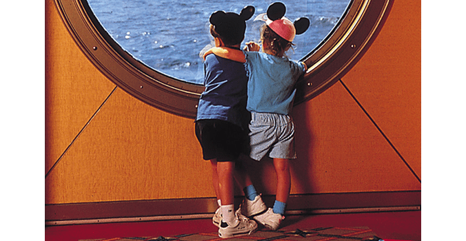 Kids looking out porthole