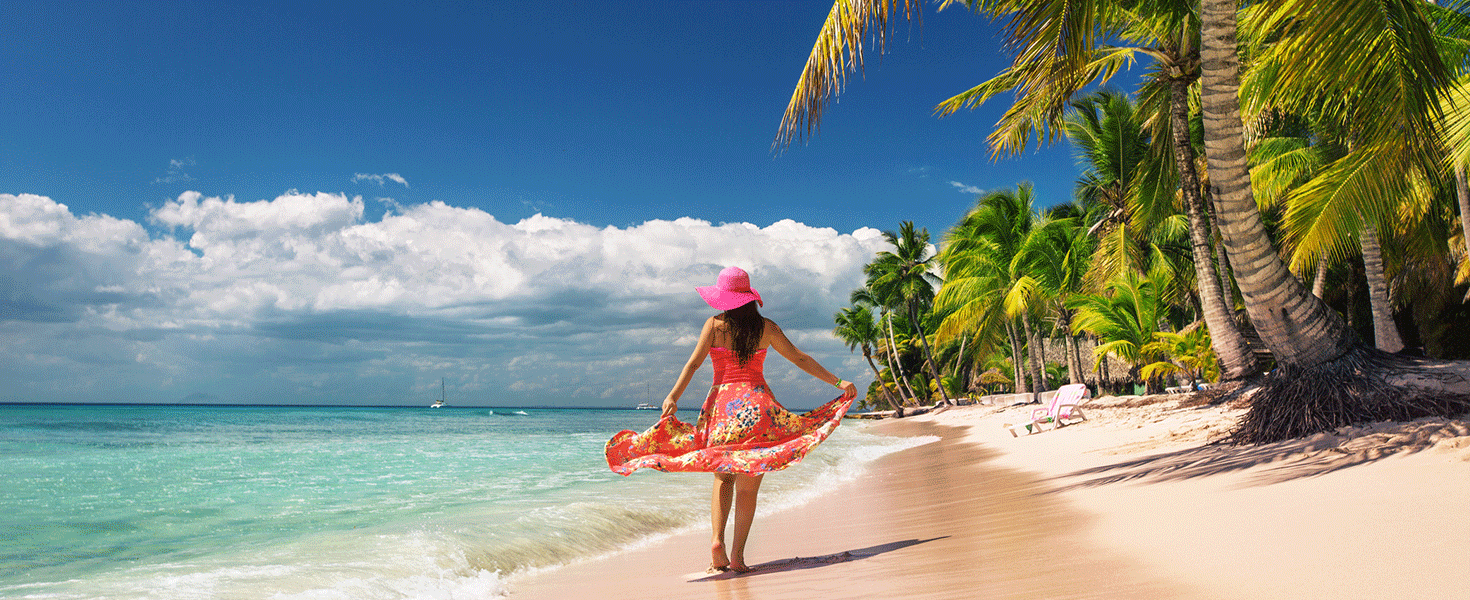 Woman walking on beach in Dominican Republic
