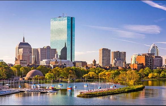 Boston, Massachusetts, USA city skyline on the river.