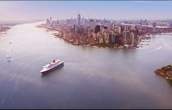Cunard cruise ship with New York City skyline in background