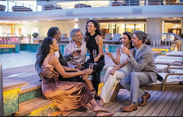 Couples enjoying a drink, relaxing and conversing on cruise ship