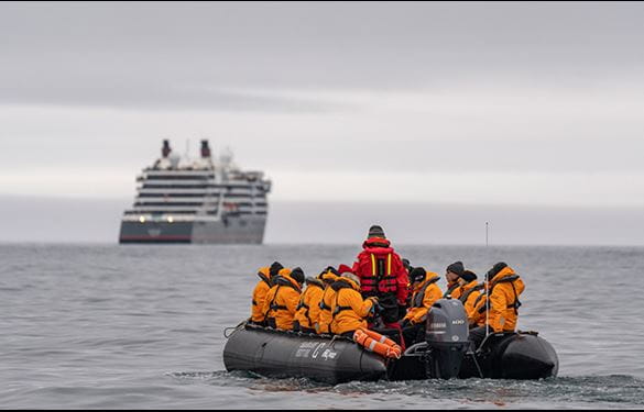 Cruise passengers in Zodiac boat exploring