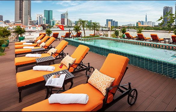 Orange lounge chairs in a row on cruise ship