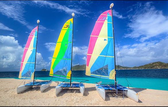 Colorful catamarans on Caribbean beach