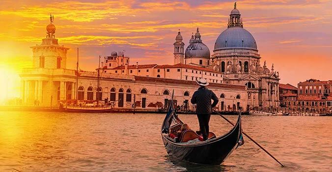Sunset and gondola in Venice