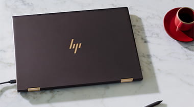 HP Laptop on table