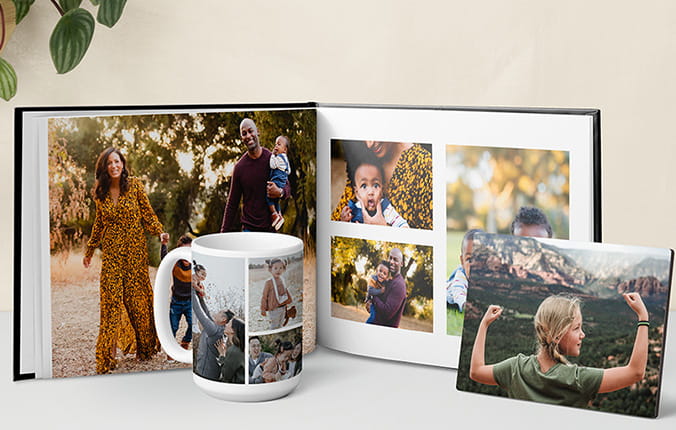 A variety of photo gifts including an album, mug and framed photo