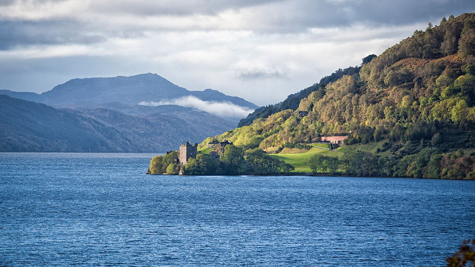 Urquhart Castle at Loch Ness Scotland Highlands on A82. Photo courtesy of Jiangli/iStock.com
