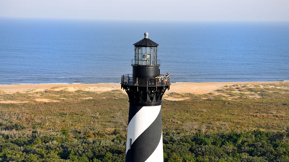 The Cape Hatteras Lighthouse is the tallest brick lighthouse in America at 208 feet, and one of three lighthouses you can climb on the OBX seasonally. Photo courtesy Outer Banks Tourism