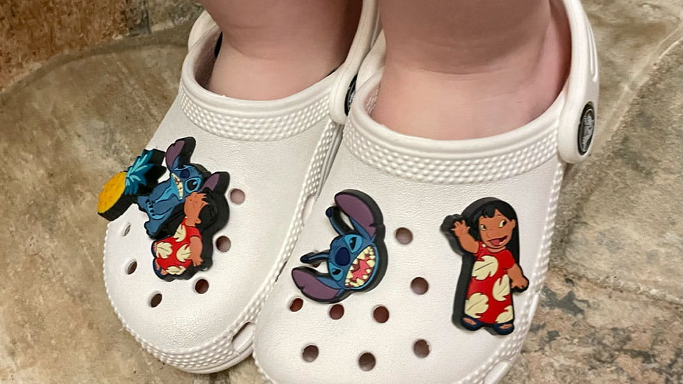 White Crocs with Lilo and Stitch charms