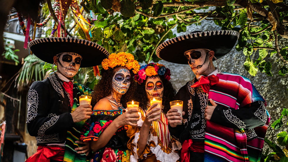 People dressed to celebrate Dia De Los Muertos 
