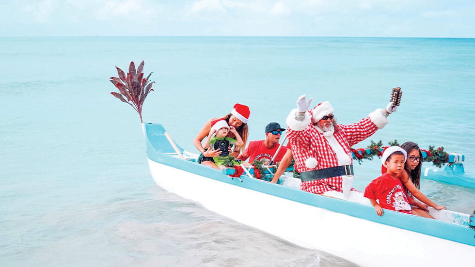 Santa on canoe in Hawaii