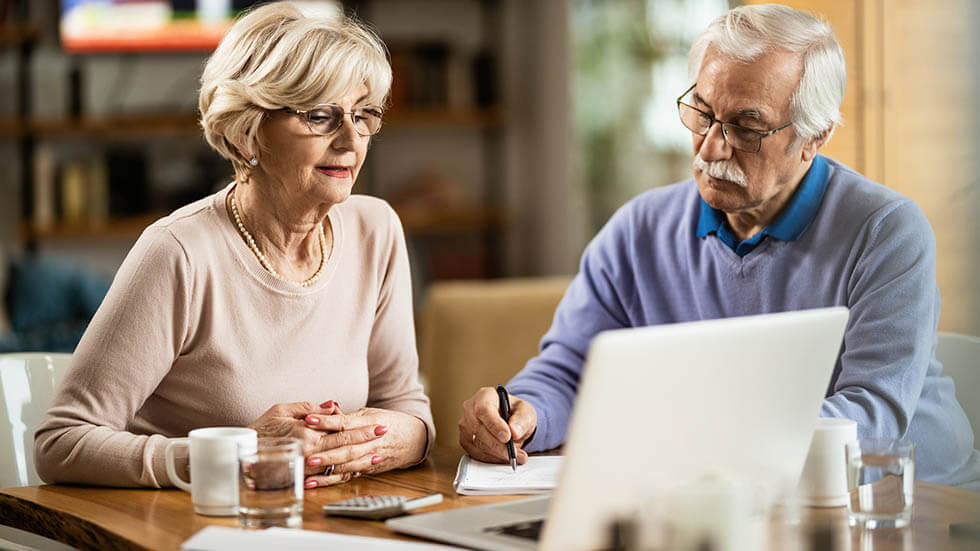 Older couple going over Taxes