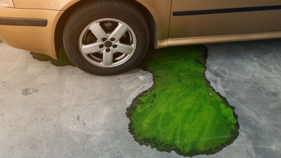 Bottom of car leaking green fluid