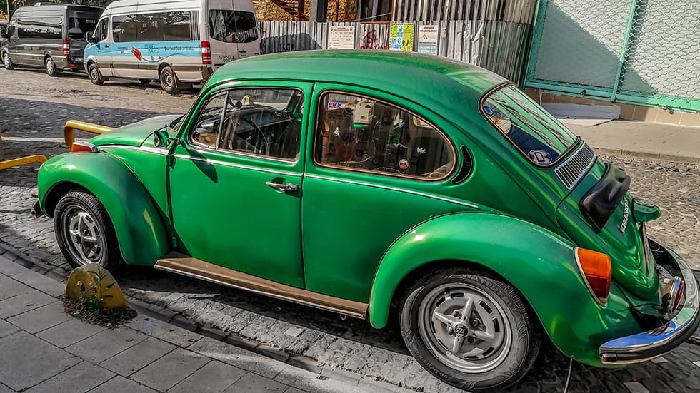 Green vintage car Volkswagen Beetle