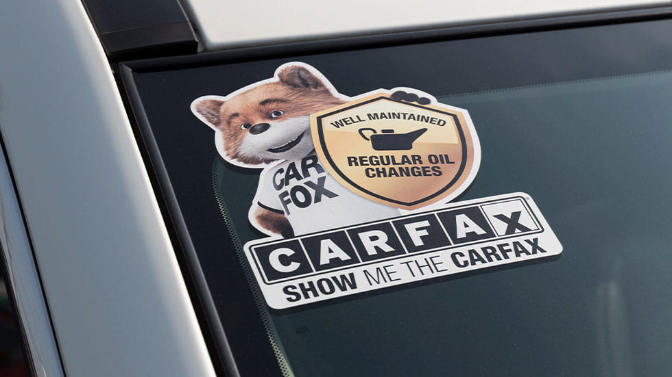 Carfax logo sticker on car windshield 