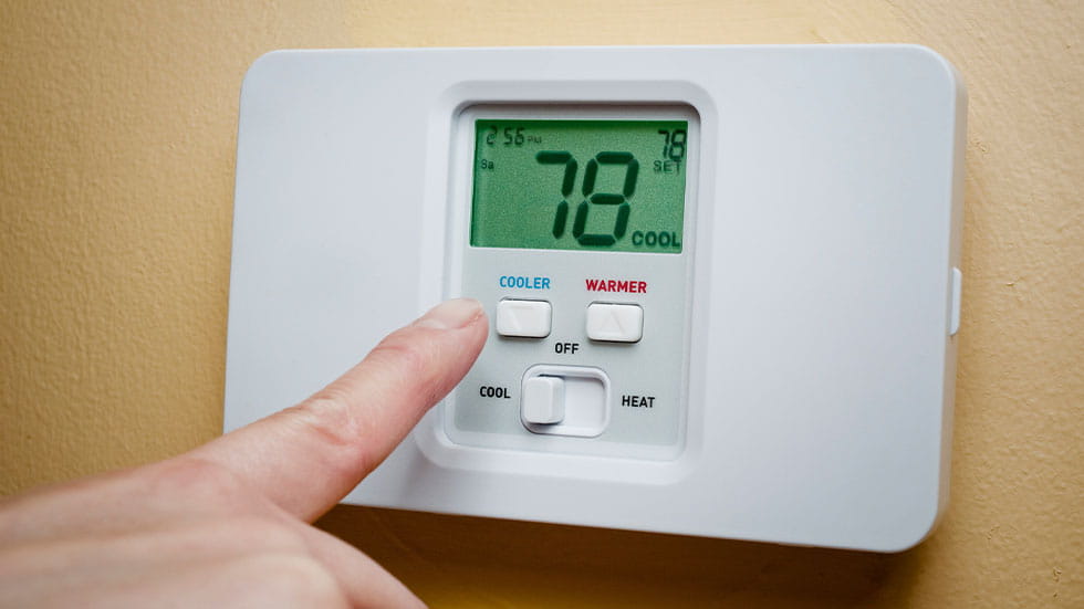 thermostat being set
