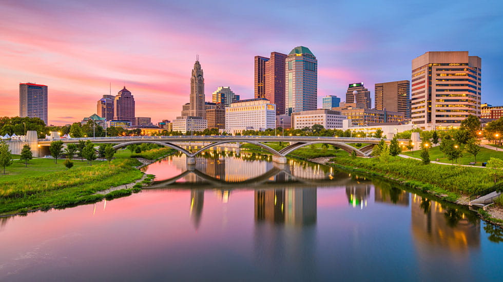 Columbus, Ohio, USA skyline on the river at dusk. Photo by Sean Pavone/iStock.com