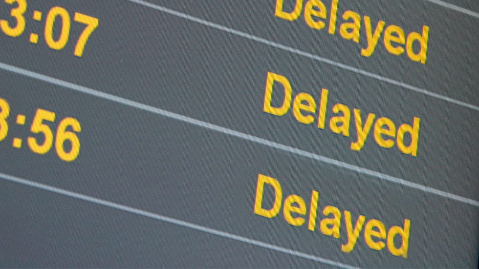 Delayed flights displayed on digital board