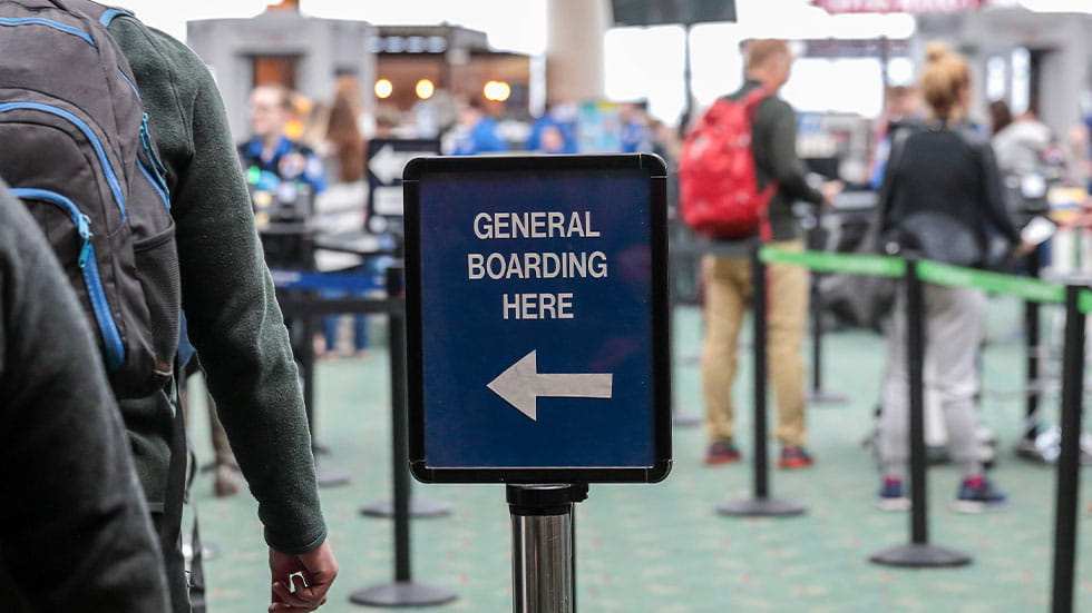 general boarding here sign at airport