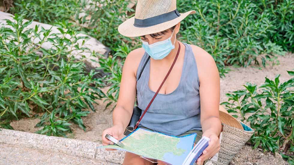 Woman preparing route in nature