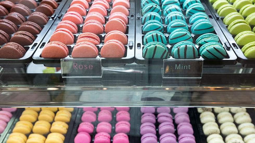 Colorful macarons display in a bakery shop. Photo by  WichitS/iStock.com