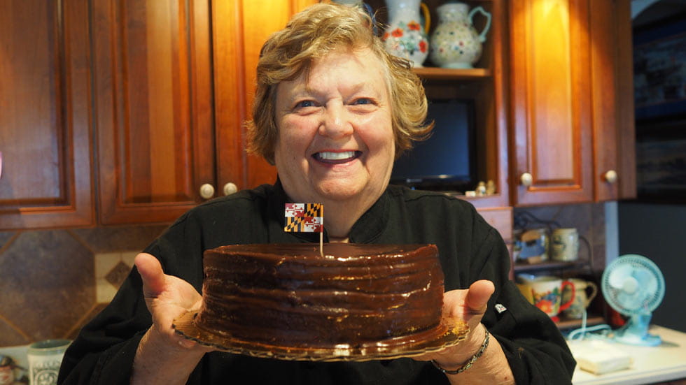 Mary Ada Marshall and her finished Smith Island Cake