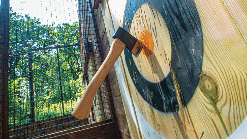 Attractions at Go Ape in Kansas City include ax-throwing. Photo courtesy of Go Ape Usa