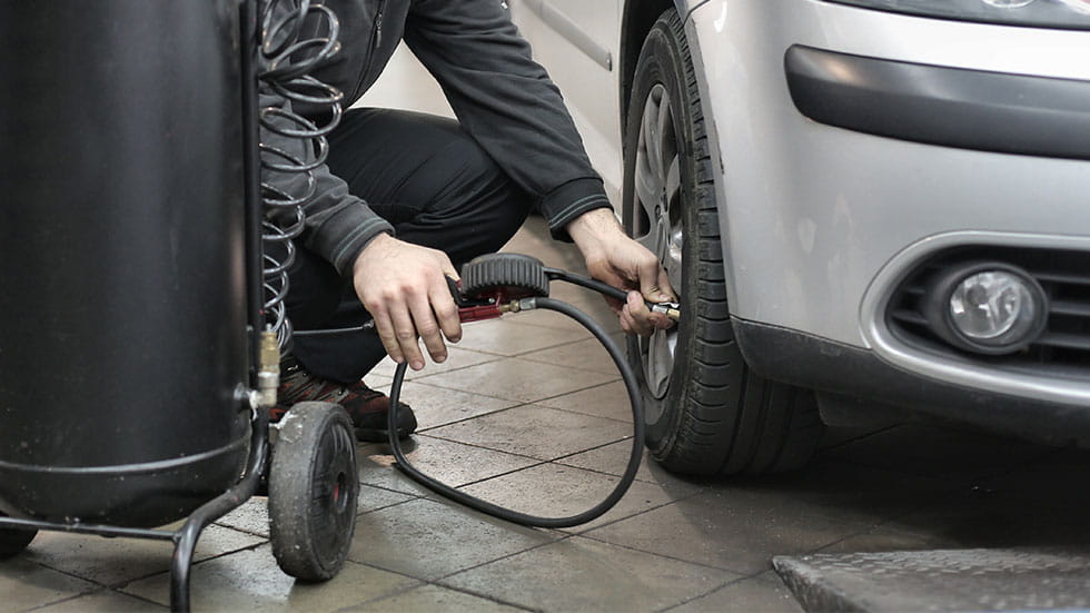 Car tire being filled with air