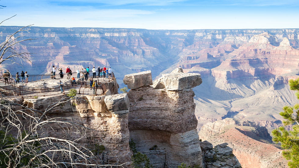 Tourists at the south rim of the grand canyon