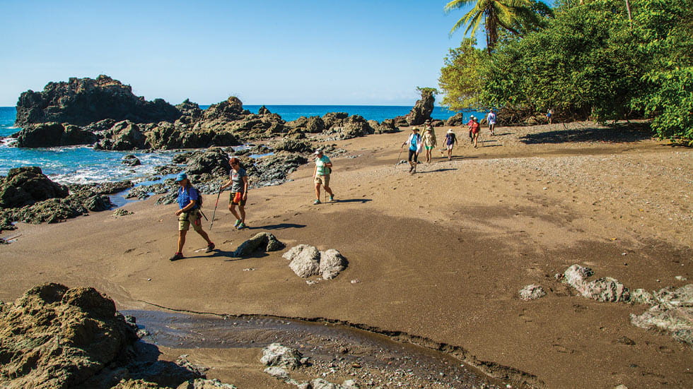 Hikers on a Coasta Rican beach