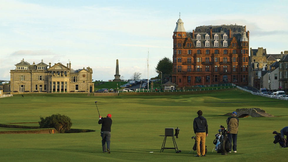 Golfers approach the last hole on the Old Course