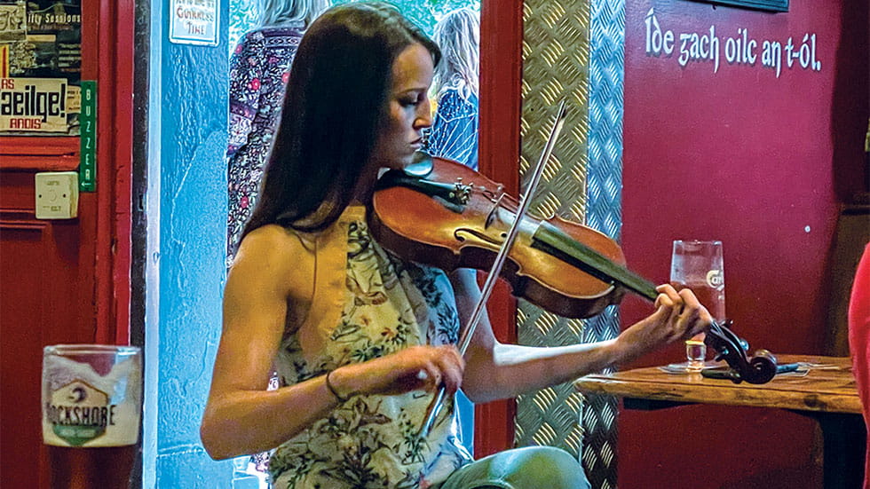 woman playing a fiddle