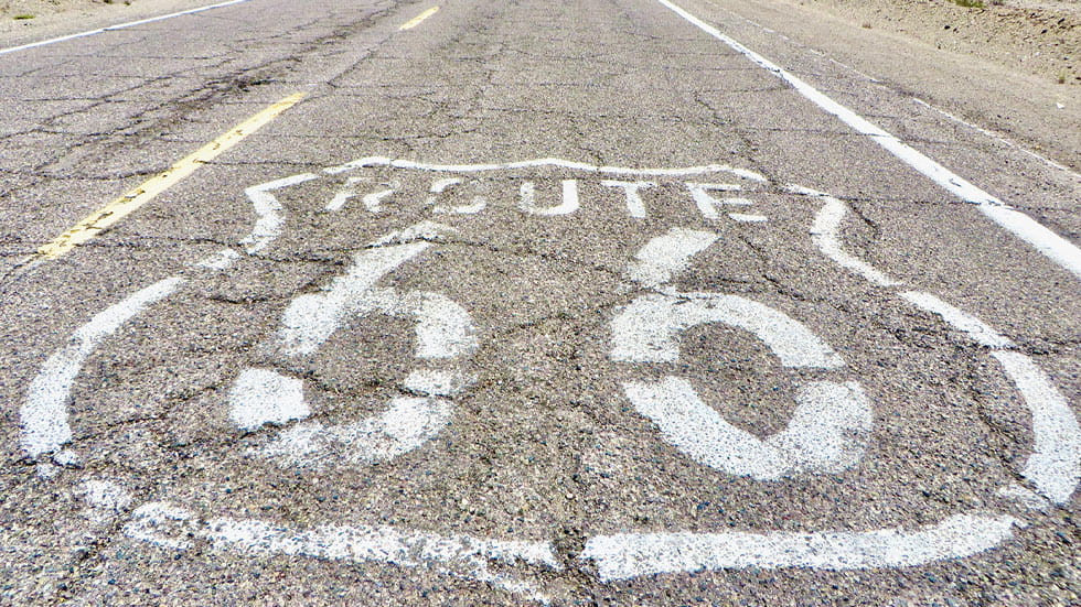 A faded “Route 66” marks the Mother Road in California’s Mojave Desert.