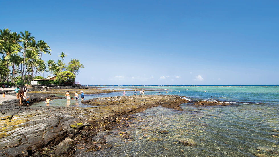 With a protected bay, Kahalu‘u Beach Park offers some of the island’s most accessible snorkeling. Photo by PhotoImage/Stock.Adobe.com