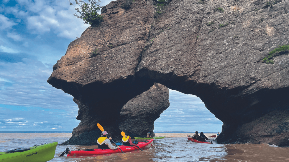Kayaking around carved rocks is a popular excursion at Hopewell Rocks Provincial Park