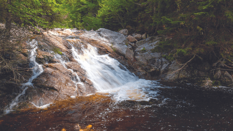 Long Beach Brook Falls is a 3/4-mile hike from Fundy Trail Parkway
